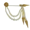 Broche en or jaune et perles
