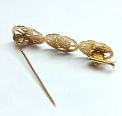 Broche en or rose idéogrammes chinois