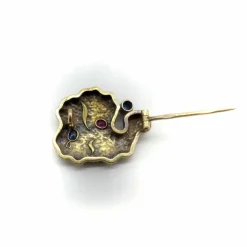 Broche en or russe avec saphir, diamant et rubis biologique