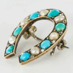Broche fer à cheval turquoises perles fines diamants