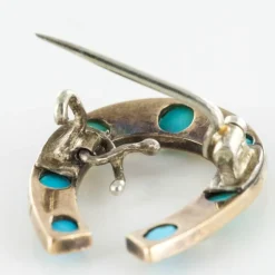 Broche fer à cheval turquoises perles fines diamants