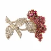 Broche Fleur deux ors, pavage rubis et diamants