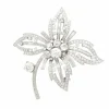 Broche "Fleur" platine, or blanc, diamants.