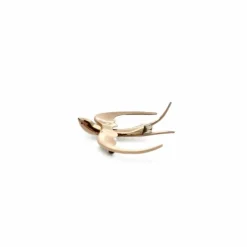Broche hirondelle or rose et blanc