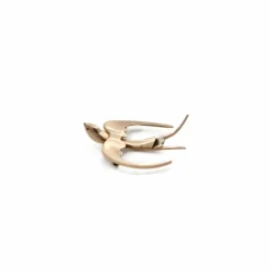 Broche hirondelle or rose et blanc