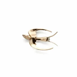 Broche hirondelle or rose et blanc