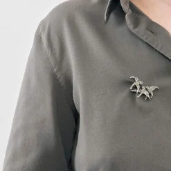 Broche Hirondelles fin XIXe en or jaune et argent, diamants