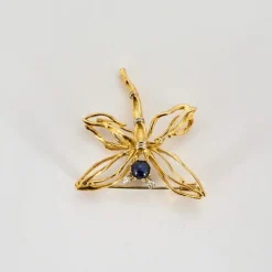 Broche Libellule or jaune et blanc, diamants et cabochon de saphir