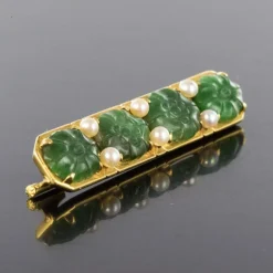 Broche ligne de jades et perles