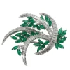 Broche émeraudes et diamants