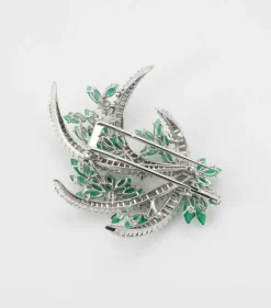 Broche émeraudes et diamants
