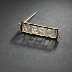 Broche 'Merci