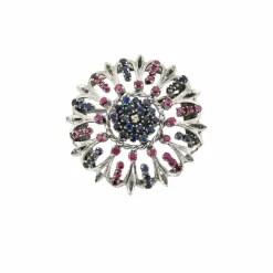 Broche motif floral or blanc saphirs