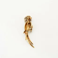 Broche motif oiseau en or jaune et émail