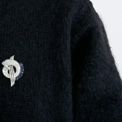 Broche mouvementée, saphir et diamants