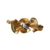 Broche noeud or rose, platine et diamants