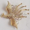 Broche OISEAU DE PARADIS or jaune diamants