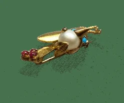 Broche oiseau or 18k perle turquoises et rubis