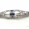 Broche or blanc 750 mil, saphir et diamants