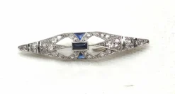 Broche or blanc 750 mil, saphir et diamants