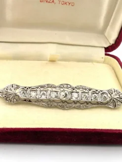 Broche or blanc avec diamants