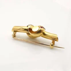 Broche or diamants et rubis