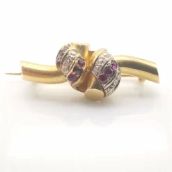 Broche or diamants et rubis