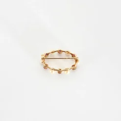 Broche or et saphir et perle