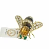 Broche or jaune et pierres précieuses signé René Kreiss