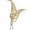 Broche, or rose, platine, diamant.