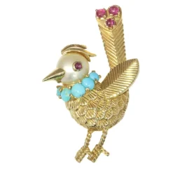 Broche ornée de bijoux