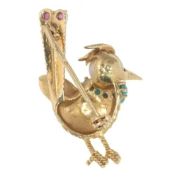 Broche ornée de bijoux