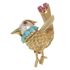 Broche ornée de bijoux