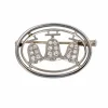 Broche ovales et ses cloches diamantées