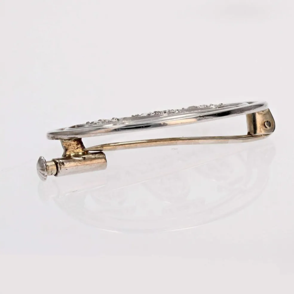 Broche ovales et ses cloches diamantées