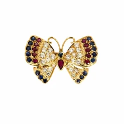Broche Papillon or jaune, saphirs, rubis