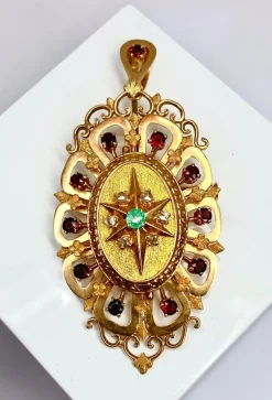 Broche pendentif or, grenats, émeraude, diamants