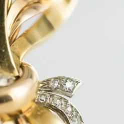 Broche rétro bouquet or et pierres précieuses