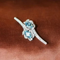 Broche rétro or gris, aigues-marines, diamants