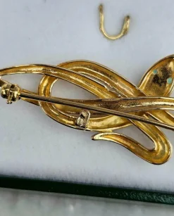 Broche serpent émeraudes