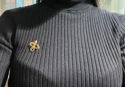 Broche Serpent or jaune, rubis, topaze