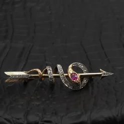 Broche serpent or jaune rubis diamants