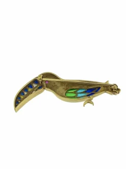 Broche toucan vintage en or jaune avec émail et rubis