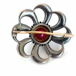 Broche tourbillonnante 19ème siècle rubis étoilé diamants