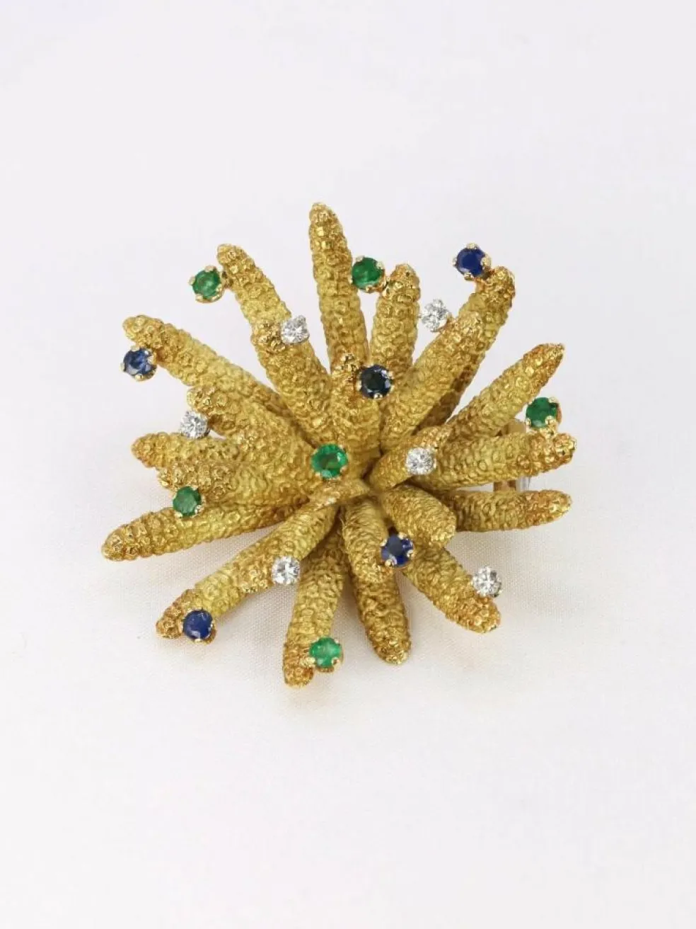 Broche vintage anémone or jaune diamants émeraudes saphirs