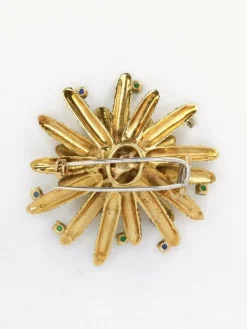 Broche vintage anémone or jaune diamants émeraudes saphirs