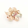 Broche vintage avec diamants et rubis