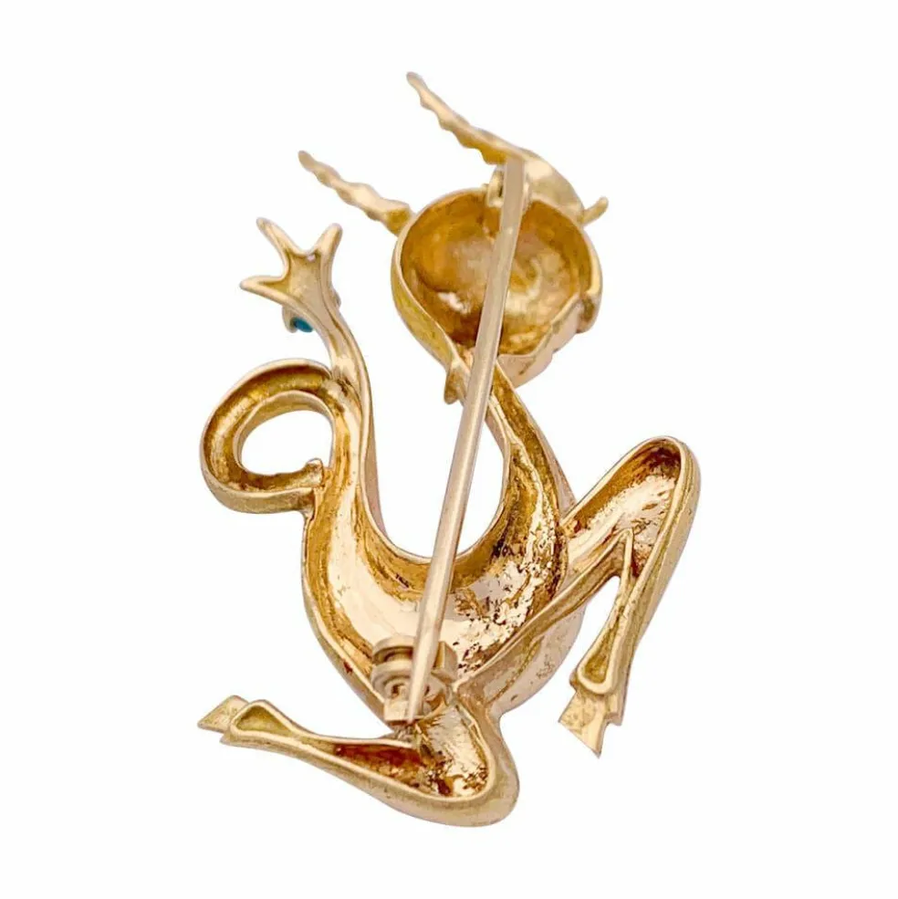 Broche vintage "Capricorne", or jaune, turquoise.