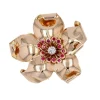 Broche vintage clip fleur diamants rubis