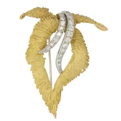 Broche vintage en or amati et diamants